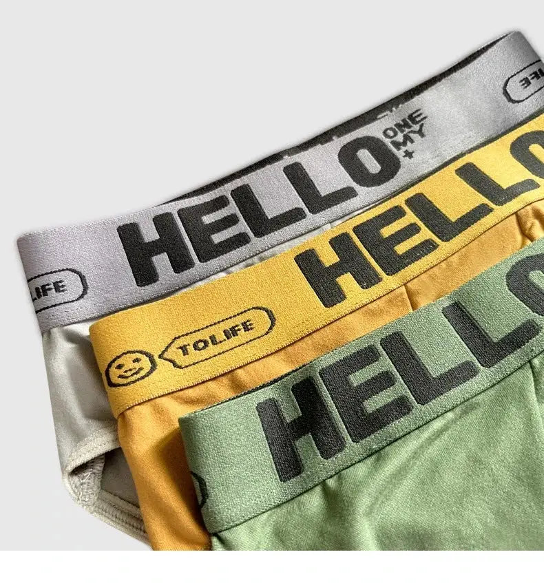 Men's briefs 4-pack with HELLO waistband in white, yellow, orange, and green