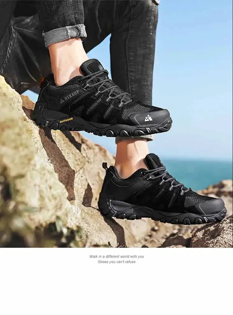 HIKEUP men's hiking shoes, black suede leather, rugged outdoor sneakers; two shoes visible