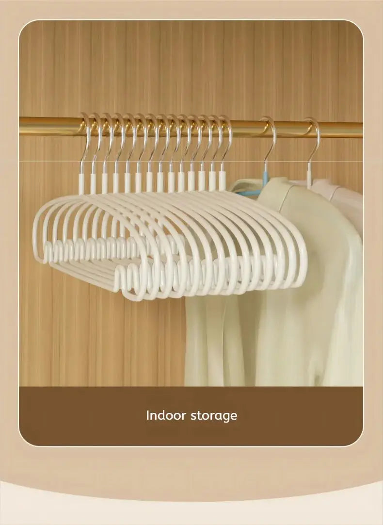 Clothes hangers, 10-pack, Simples Market non-slip white plastic hangers for indoor storage.