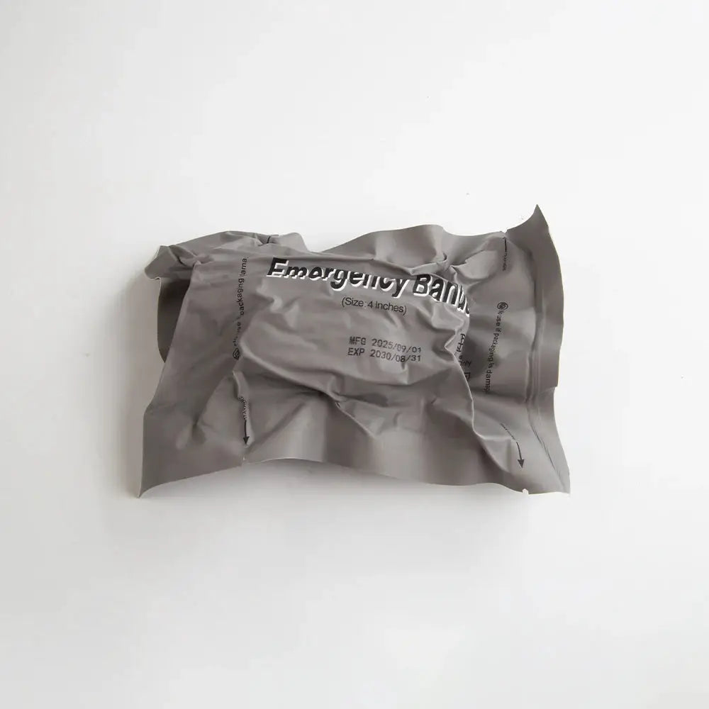 Israeli Bandage emergency medical kit pouch, gray sealed package marked Emergency Bandage