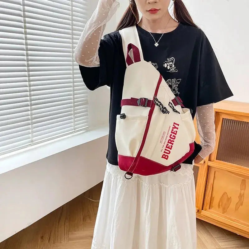 Crossbody bag by Simples Market; cream nylon with burgundy accents, unisex Y2K travel chest pack.