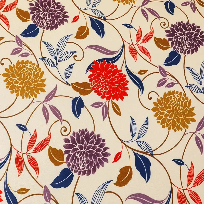Floral printed stretch sofa cushion cover and backrest protector in beige with red, purple, gold flowers.