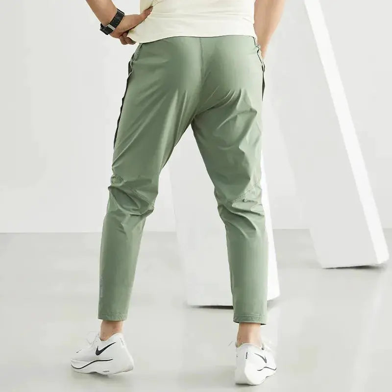 Men's running pants olive green with lightweight quick-dry fabric