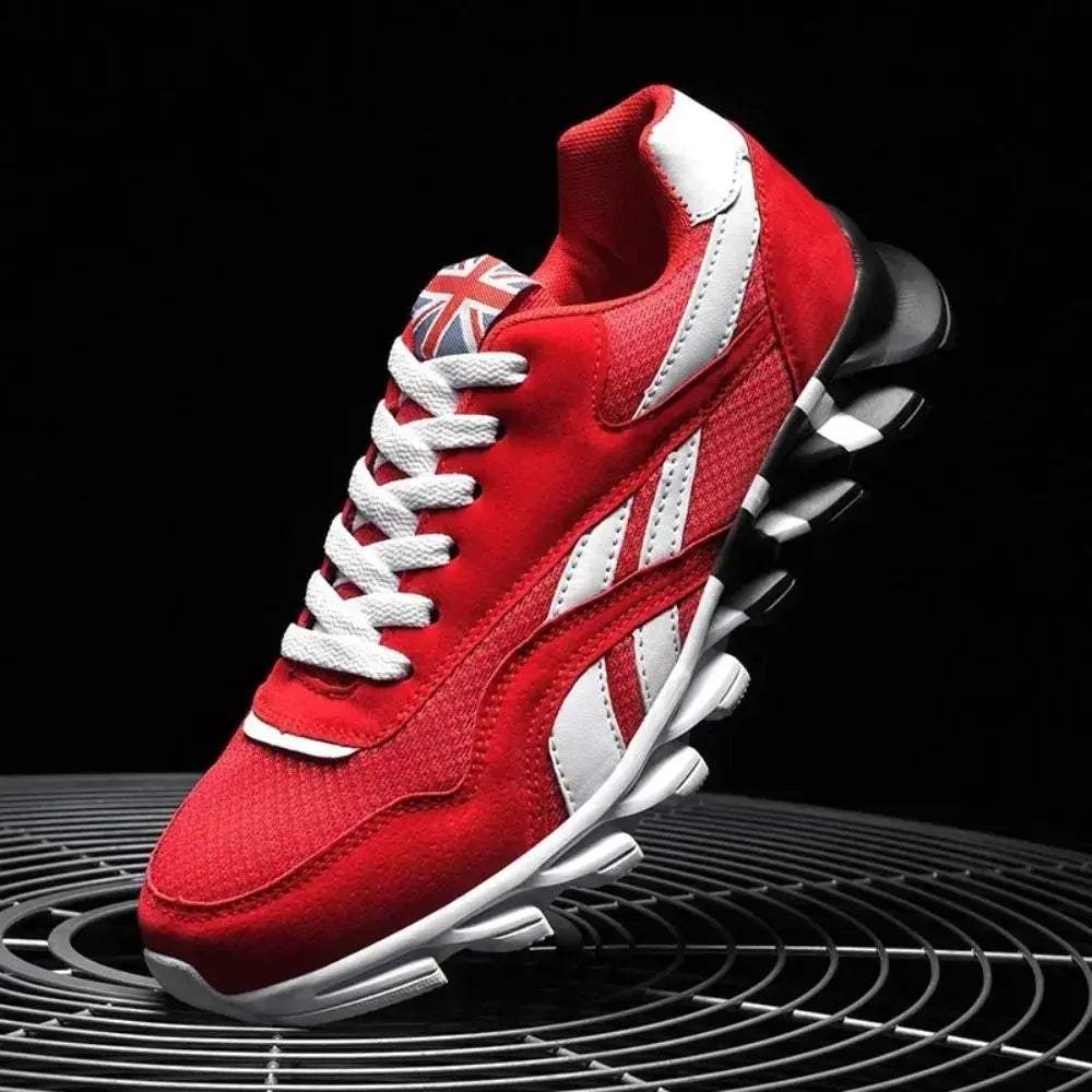 Men's red sneakers with white stripes, Union Jack tongue patch, and thick segmented white sole.