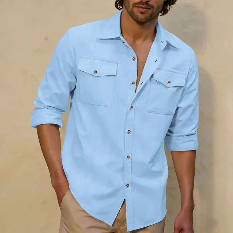 Men's light blue linen long-sleeve casual shirt with two chest pockets and brown buttons.