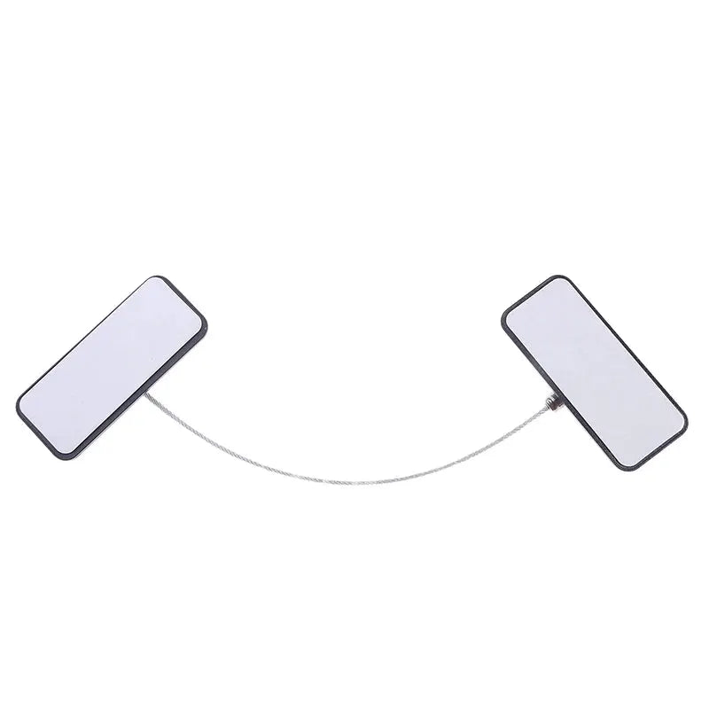 Child safety window lock pair by Simples Market, white rectangular pads linked by a metal wire