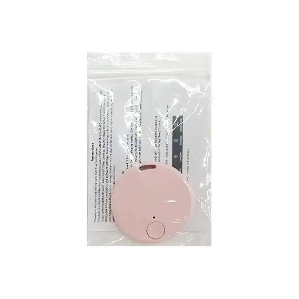 Simples Market pink round GPS Bluetooth 5.0 anti-lost tracker for pets, compact key/pet finder in packaging.