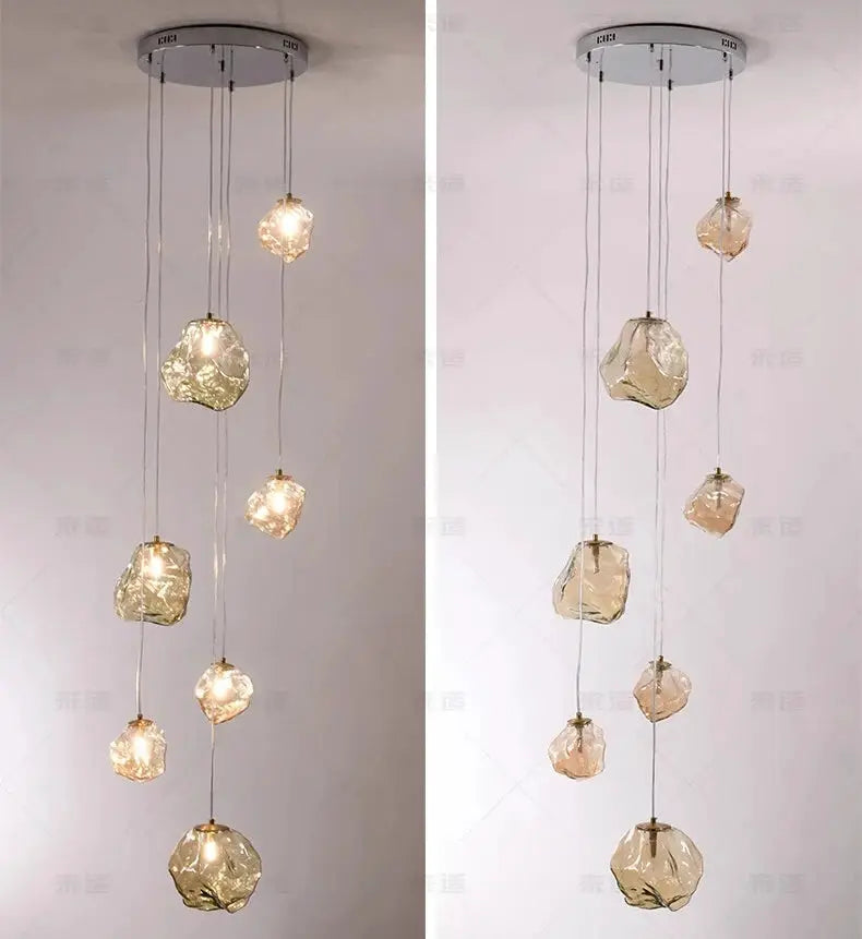 Modern LED crystal pendant light with several hanging glass orbs from a round ceiling mount