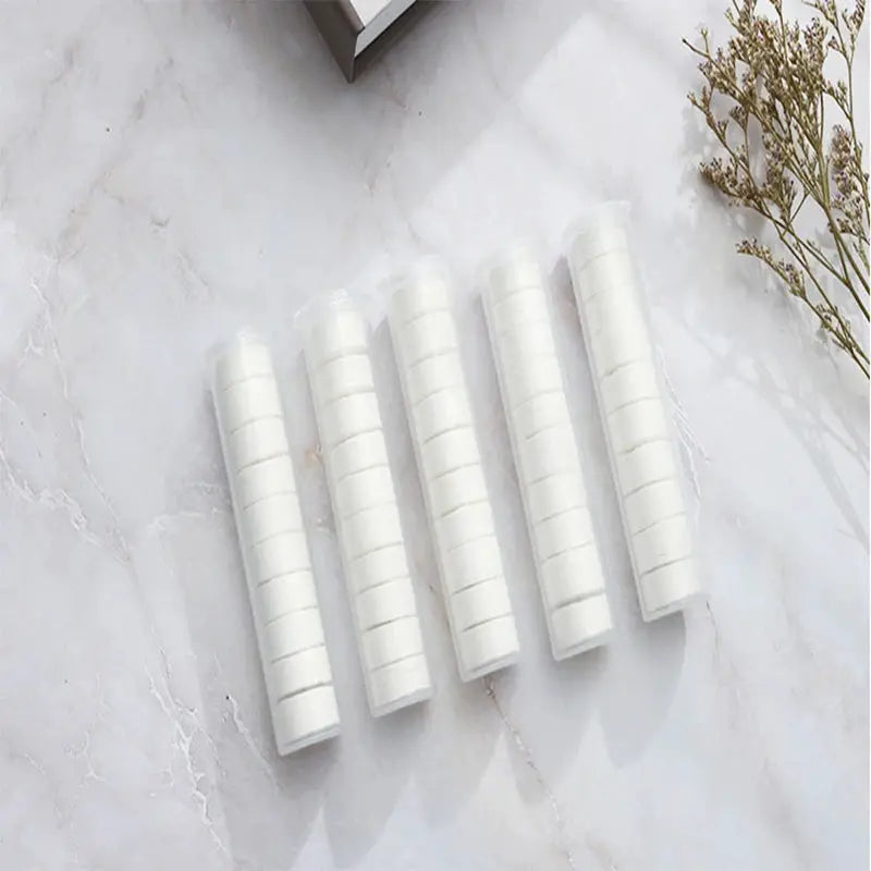 Simples Market compressed towels, 10/20 pcs, five tubes shown, portable non-woven moistened face towels
