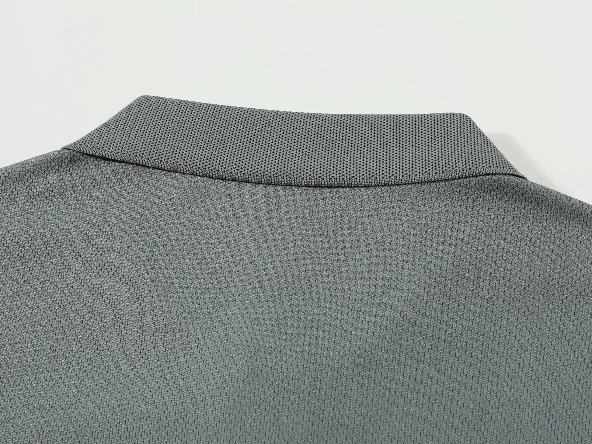 Simples Market men's grey polo shirt with collar, textured knit fabric.