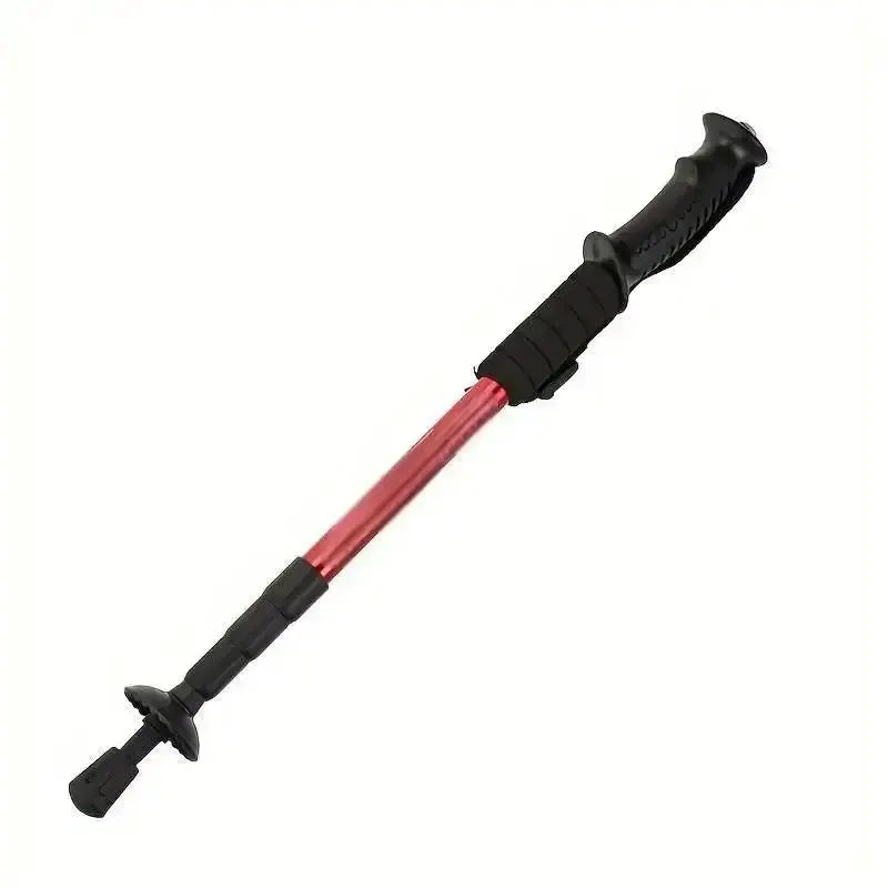 Ultralight trekking pole Simples Market, red shaft with black grip, foldable shock-absorbing design.