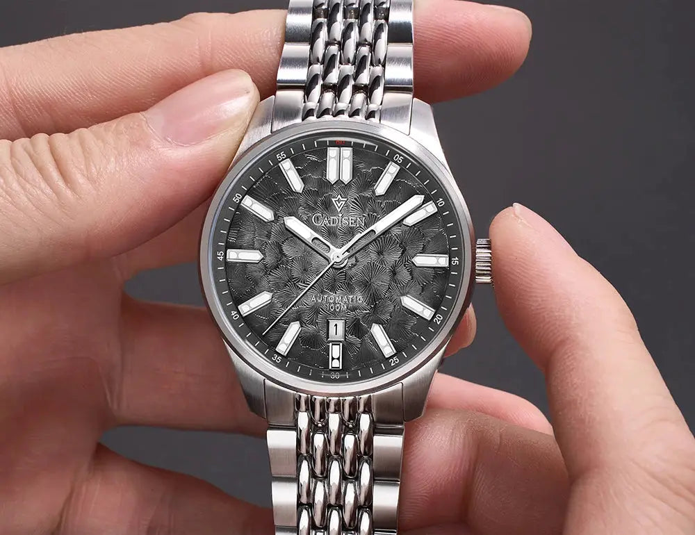 CADISEN men's automatic wristwatch with blue textured dial, stainless steel bracelet, 10ATM water resistance.