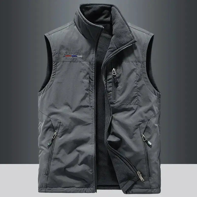 Men's heated outdoor gilet vest, grey with fleece lining, zip chest pocket and dual hand pockets