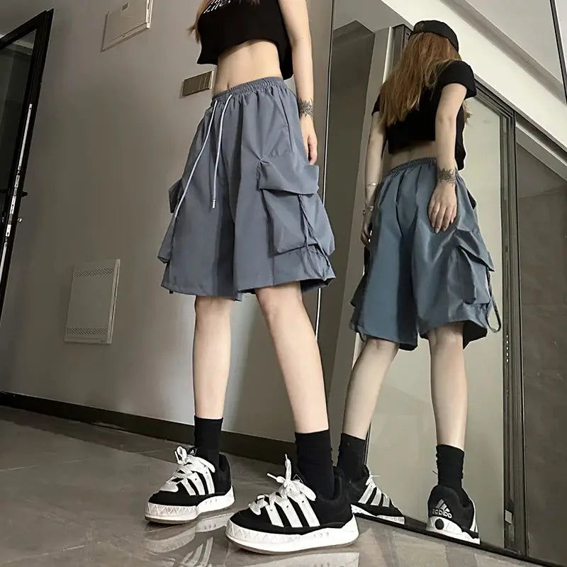 ZOKI women's high-waist cargo shorts in gray with large cargo pockets.