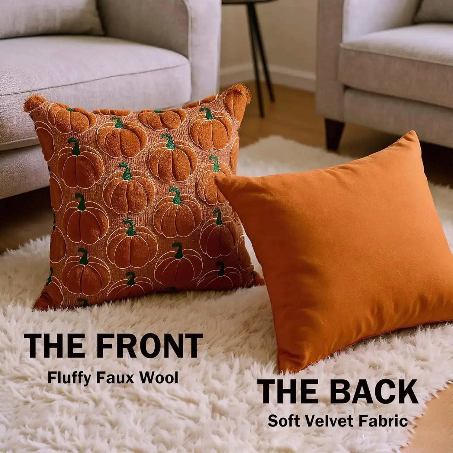Two orange throw pillows on a white shag rug; pumpkin-print front pillow and solid orange velvet back