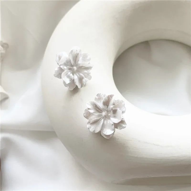 White camellia flower stud earrings for women by Simples Market