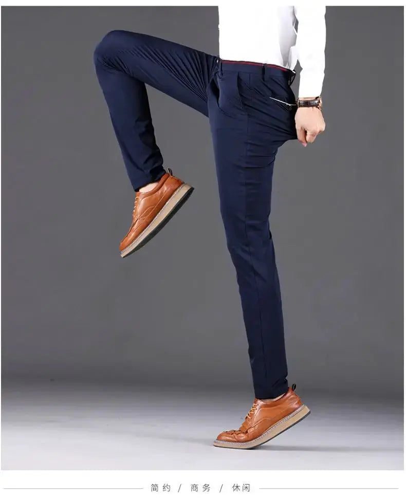 Men's elastic waist dress pants in navy, wrinkle-resistant slim-fit office trousers.