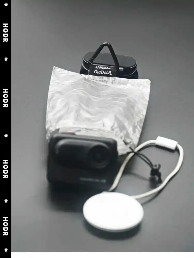 StashLite lantern diffuser kit in Dyneema DCF stuff sack; ultralight cuben-fiber bag with diffuser disk