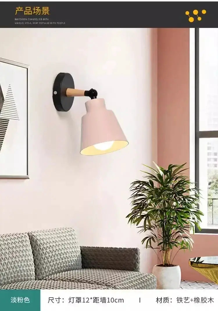 Nordic solid wood LED wall lamp with black round base and pink shade by Simples Market.