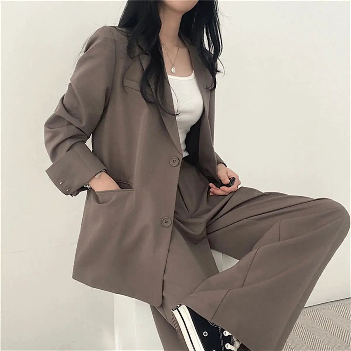 Women's taupe 2-piece suit jacket and wide-leg pants set; office-ready blazer with matching trousers