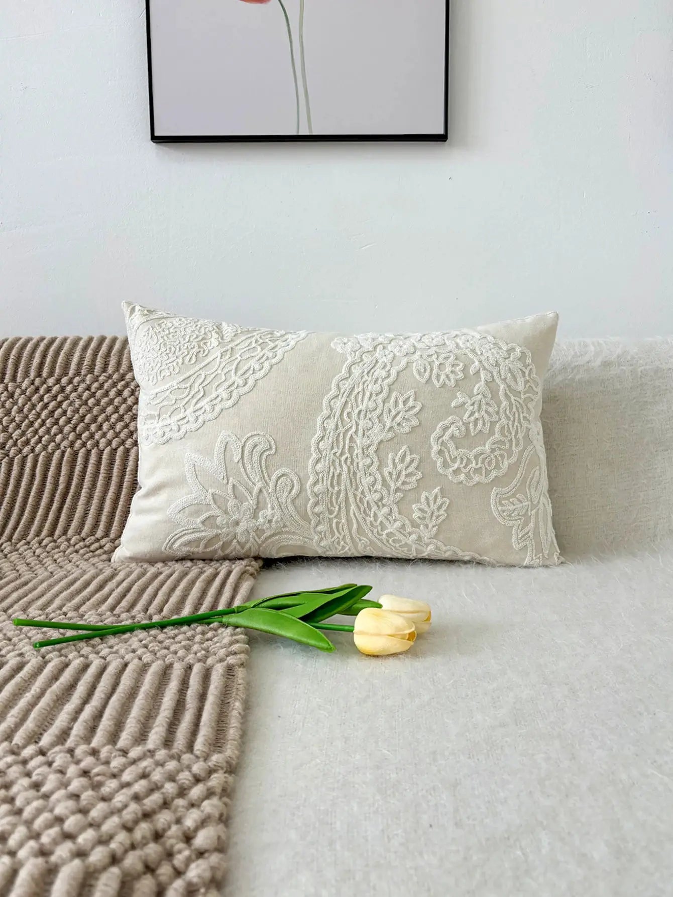 Embroidered throw pillow by Simples Market, cream beige fabric with white lace embroidery, decorative cushion