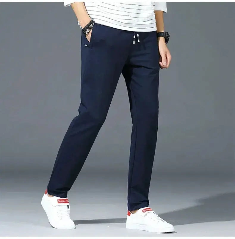Men's navy blue jogger pants with elastic drawstring waist