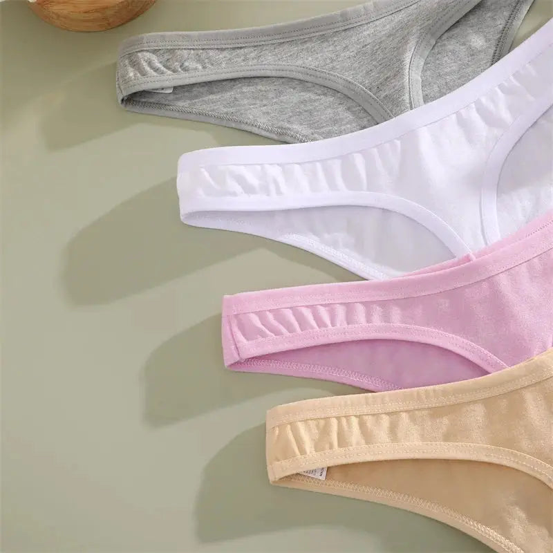 4-pack women's cotton seamless low-rise V-waist thong underwear in gray, white, pink, beige.