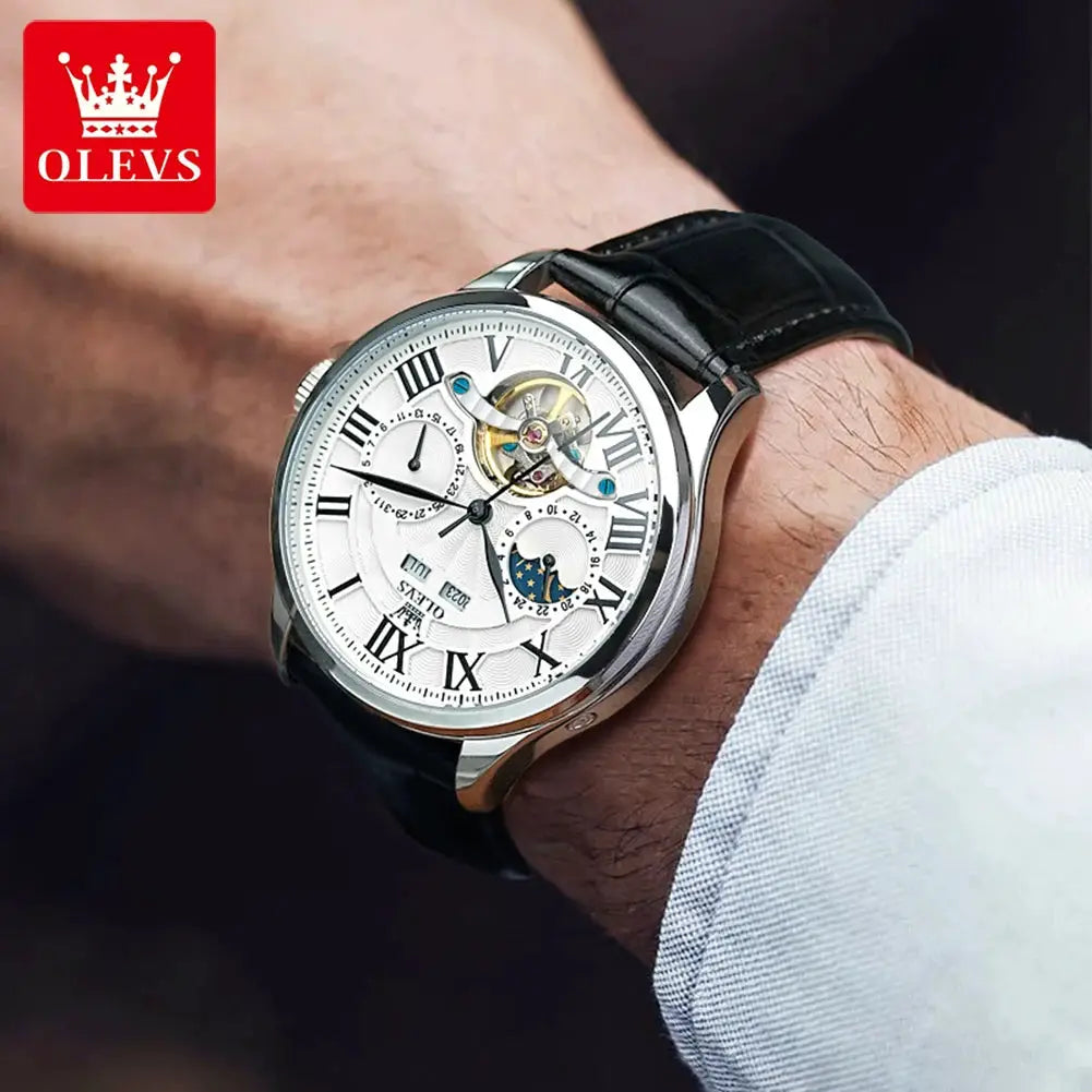 OLEVS 7013 men's skeleton moon phase automatic watch with silver case, white dial, black leather strap