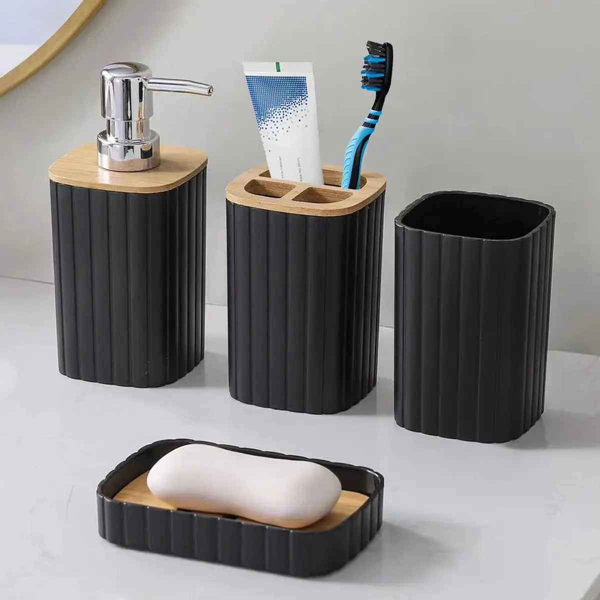 4-piece bathroom set with black ribbed containers and wood tops: soap dispenser, toothbrush cup, holder, and soap dish.