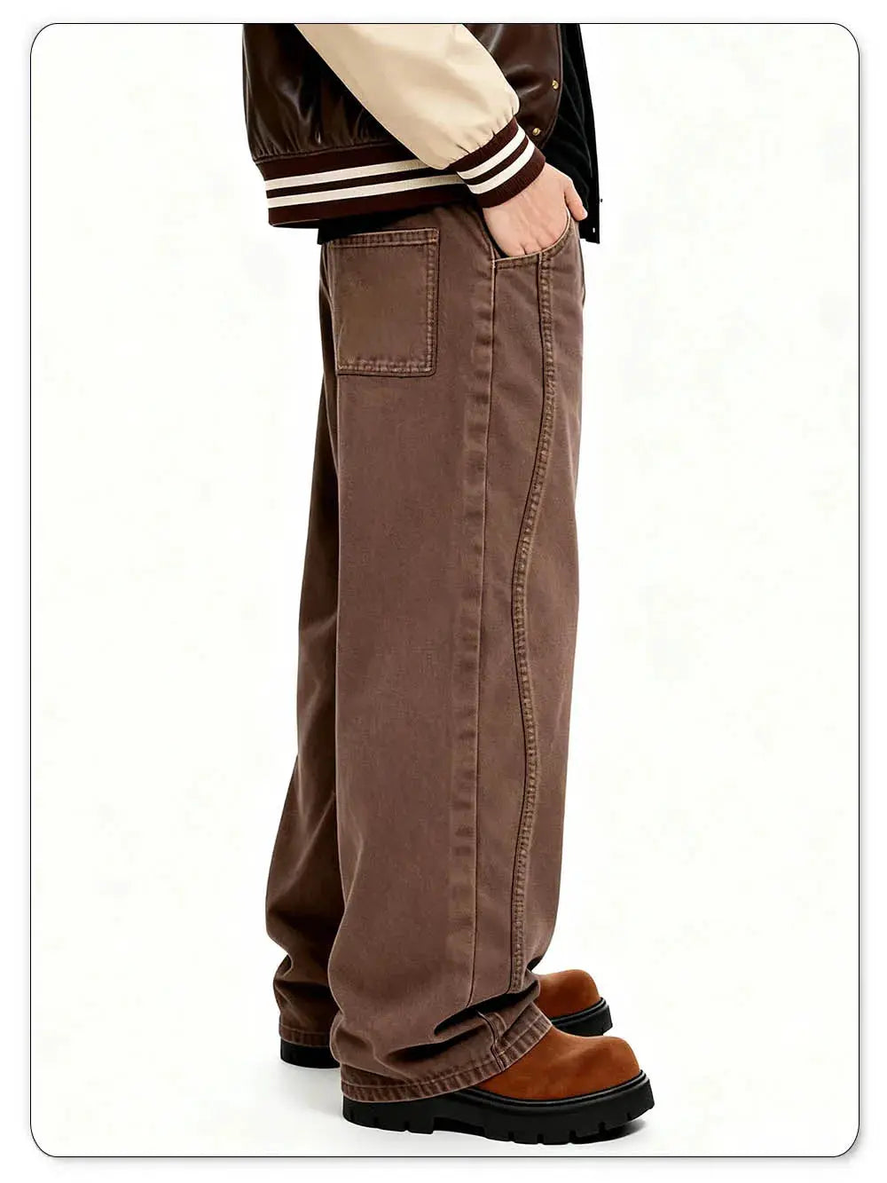 Brown baggy wide-leg denim jeans with patch pocket, paired with brown suede boots