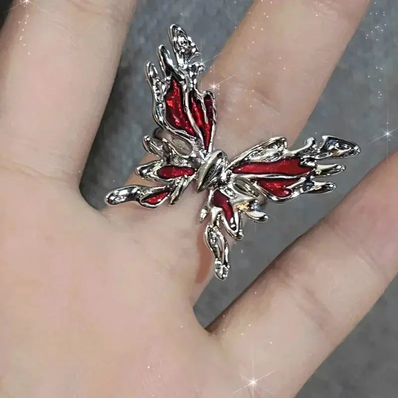 Goth-punk open ring in silver-tone with red crystal heart cross-geometry accents