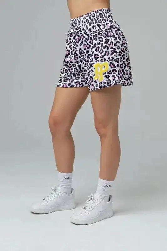 Men's leopard-print quick-dry athletic shorts with a yellow P logo patch