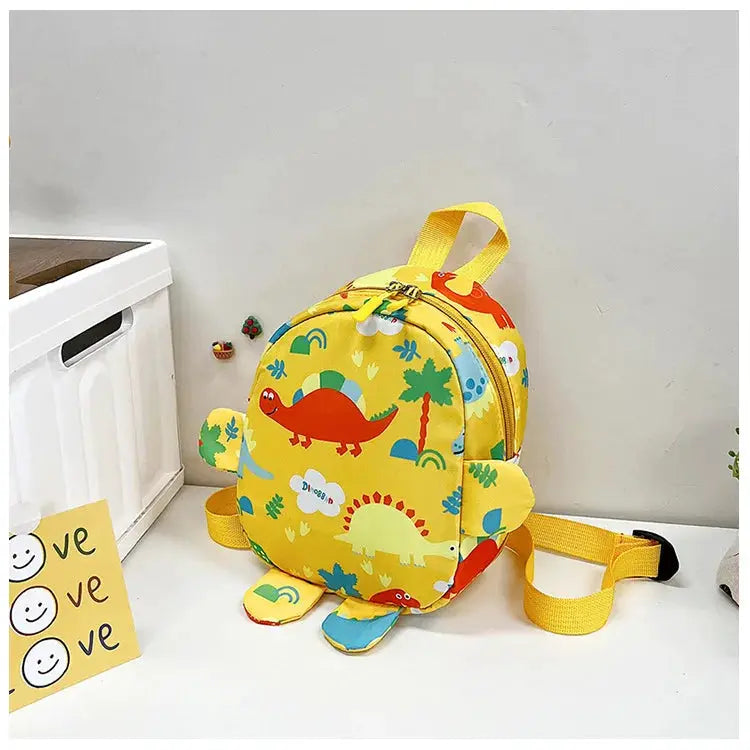 Dinosaur kids backpack, yellow with colorful cartoon dinosaurs and palm trees, Simples Market