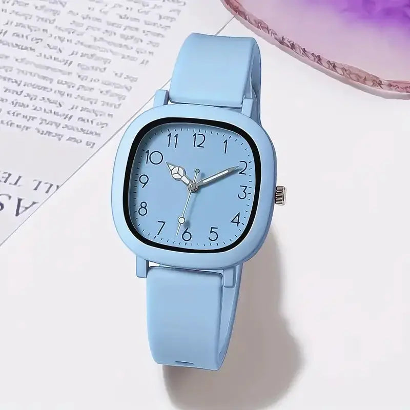 Wristwatch with blue silicone band, square case and Arabic dial