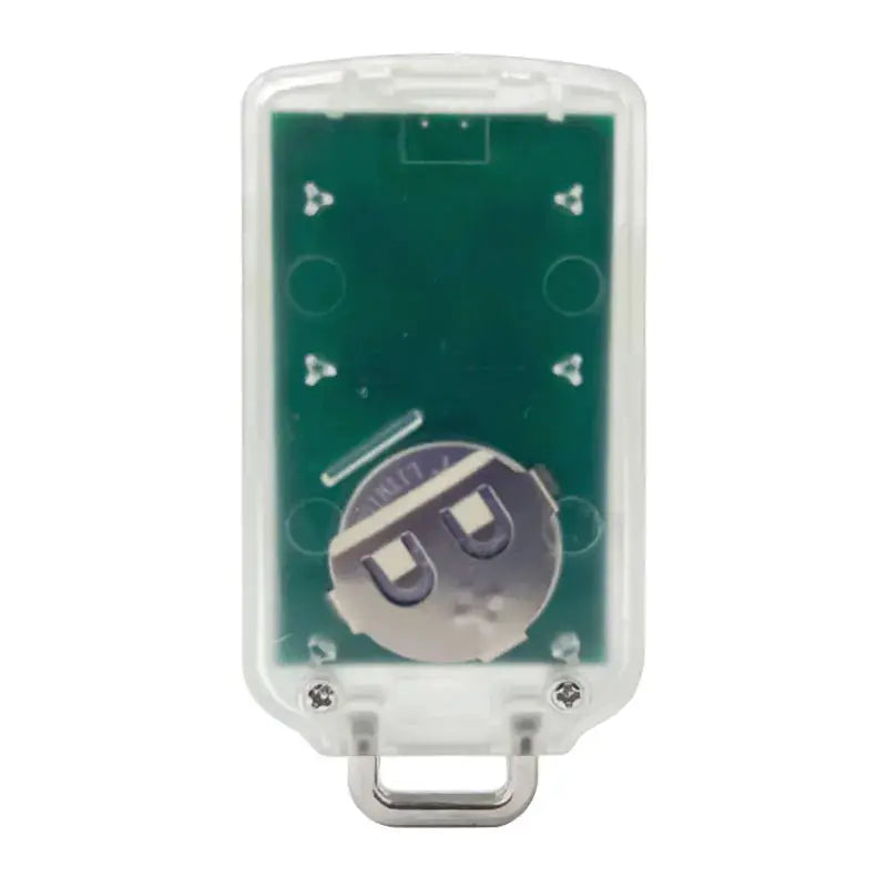 Universal garage door remote in a clear case with a green PCB.