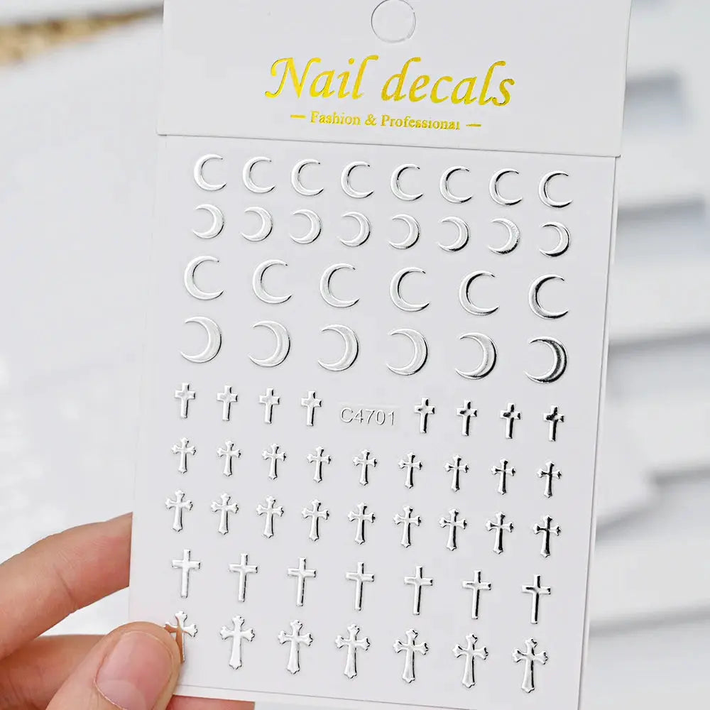 Nail decals set: 6-sheets metal silver self-adhesive stickers displaying crescent moons and crosses.