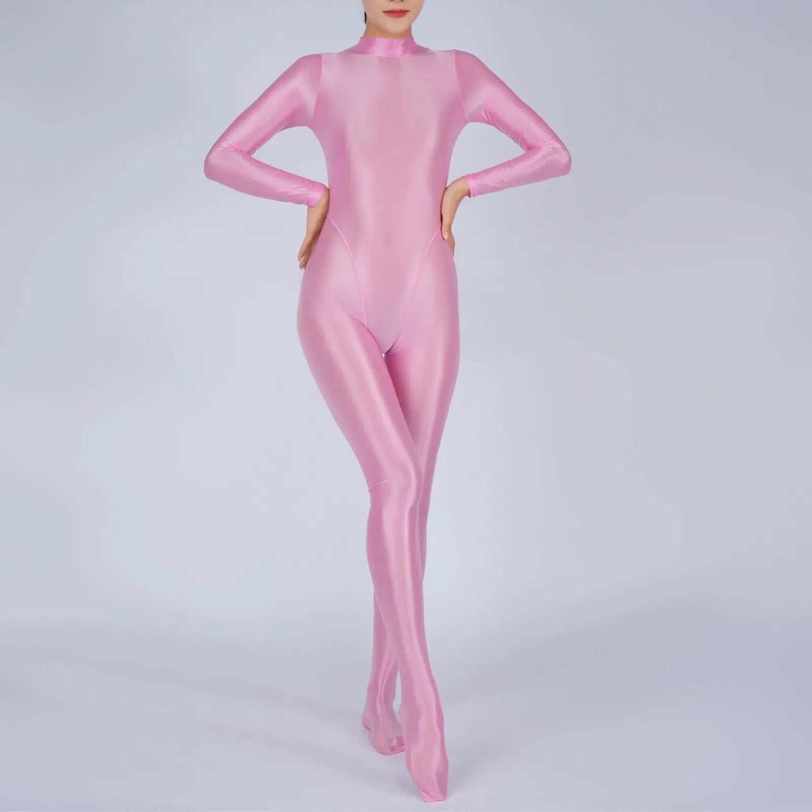 Simples Market women's pink metallic full-body jumpsuit with long sleeves and footed legs.