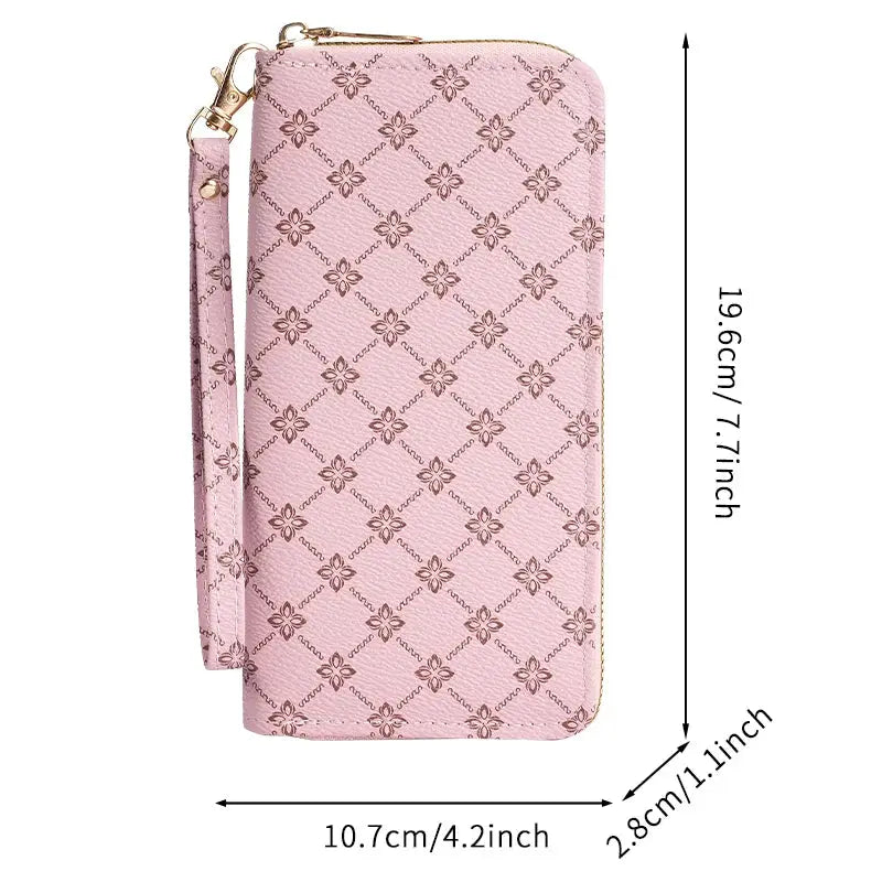 Long pink wallet clutch with geometric pattern, large capacity, zipper closure and wrist strap