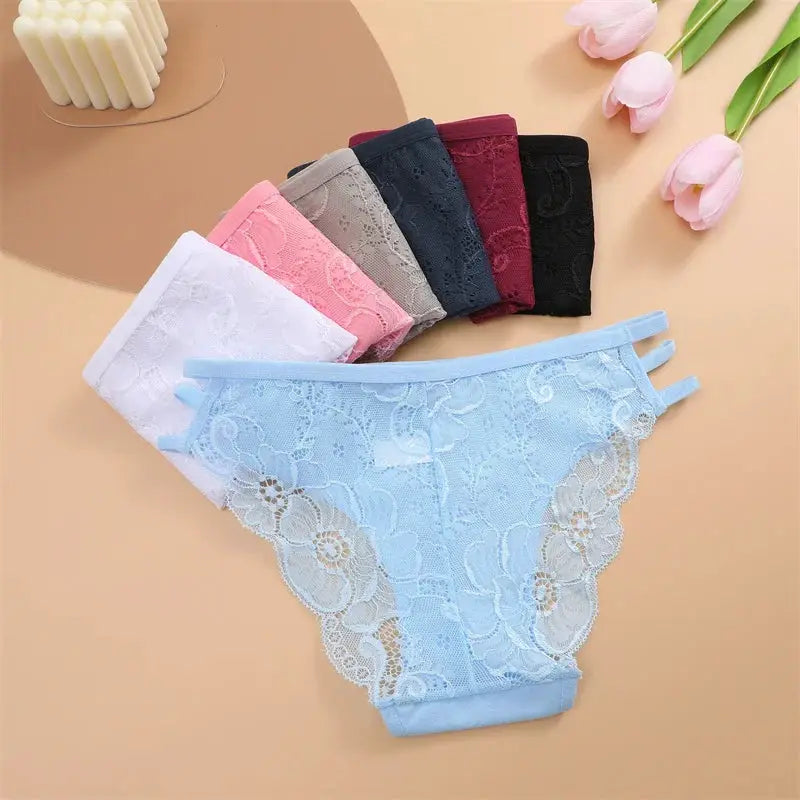 7-piece women's lace panties set in assorted colors; sheer floral lace, low-rise with elastic straps