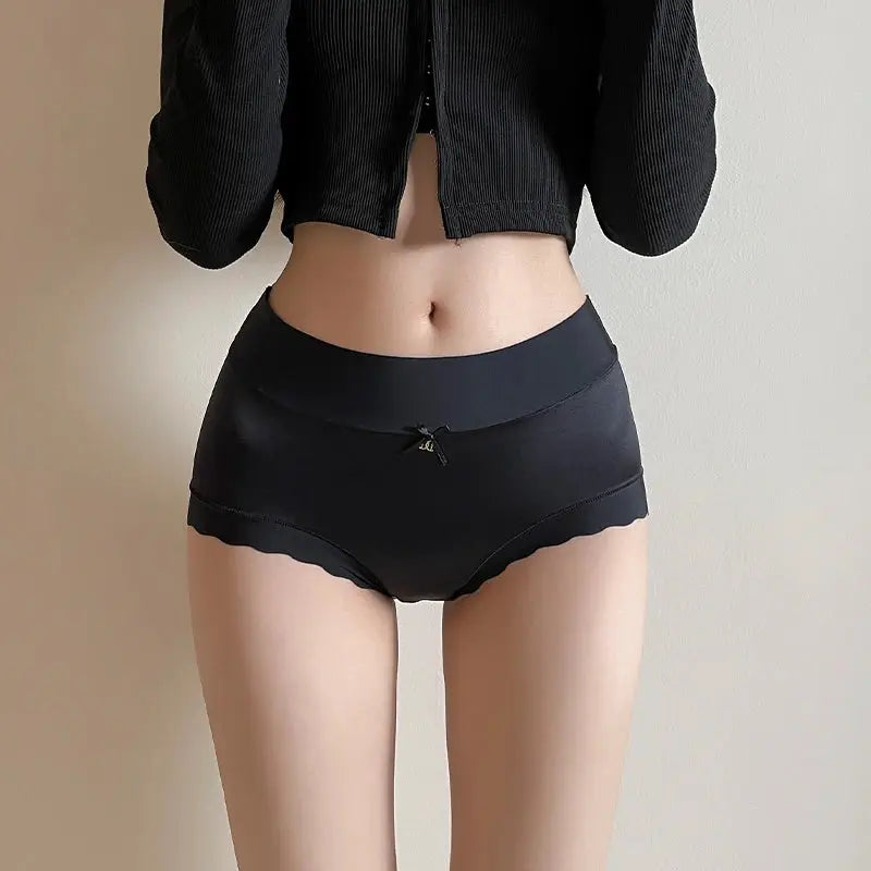 Silk mid-rise panties, black with bow and scalloped hem.