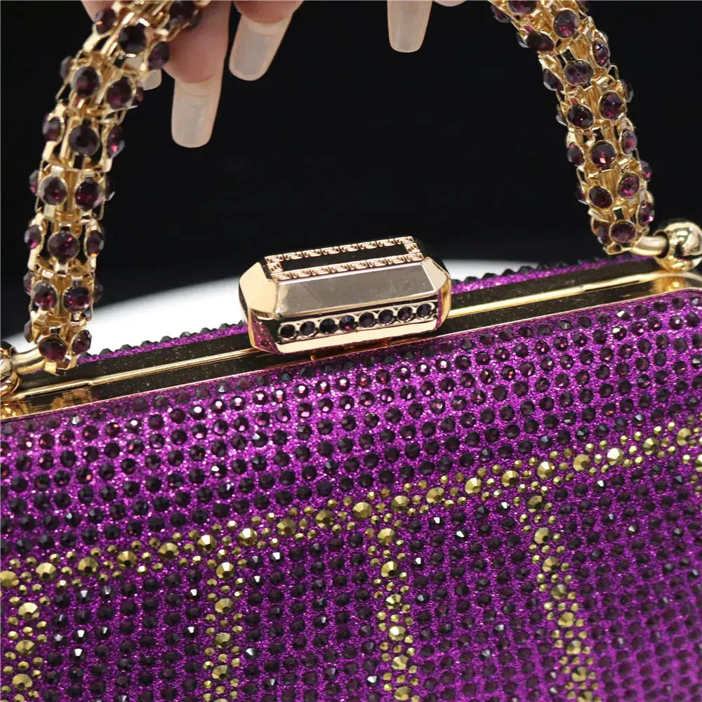 Simples Market purple rhinestone evening clutch with diamond-design gold-tone chain handle.