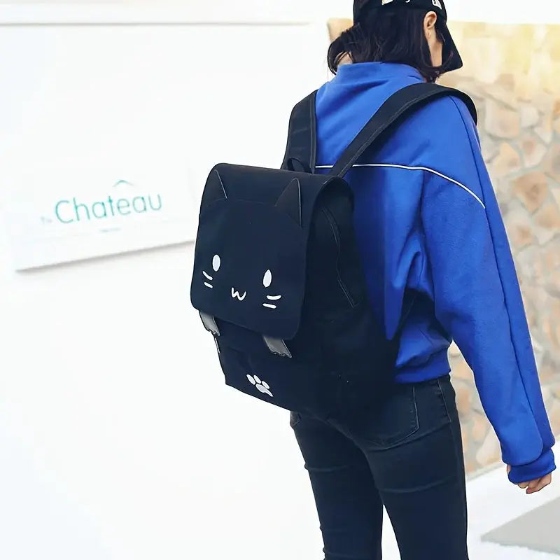 3D cat backpack, black large-capacity with white cat-face and paw-print accents