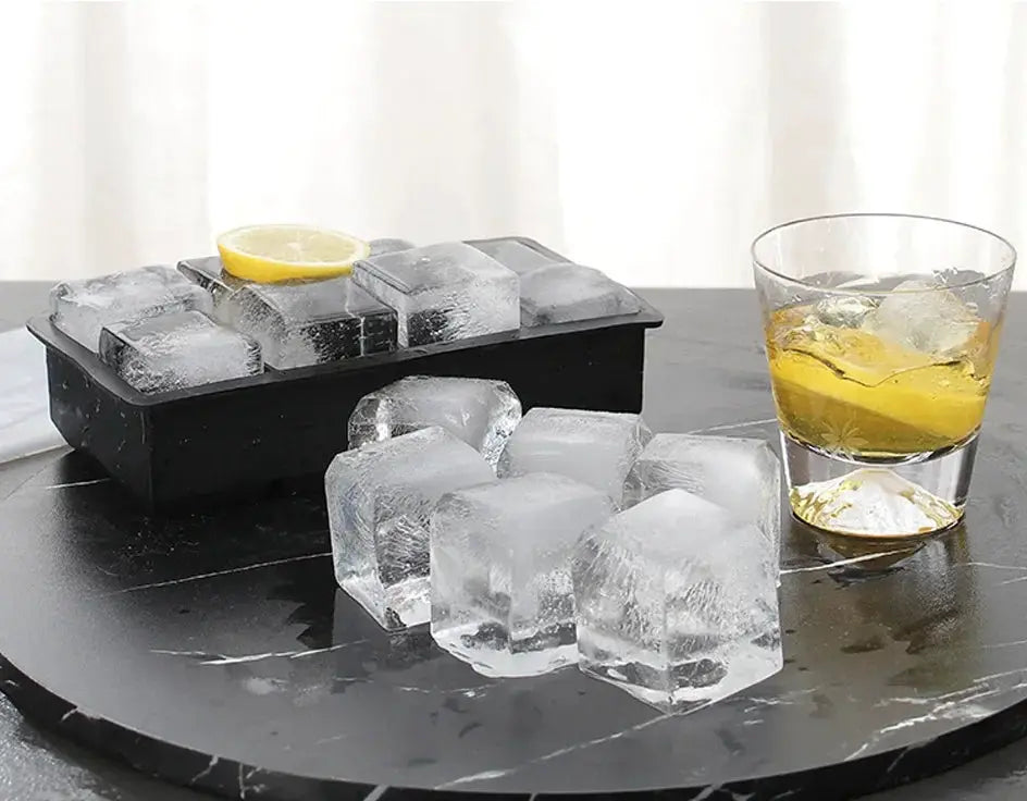 Ice cube tray silicone with lid, black 4/6/8-grid mold for whiskey, shown with clear ice cubes.