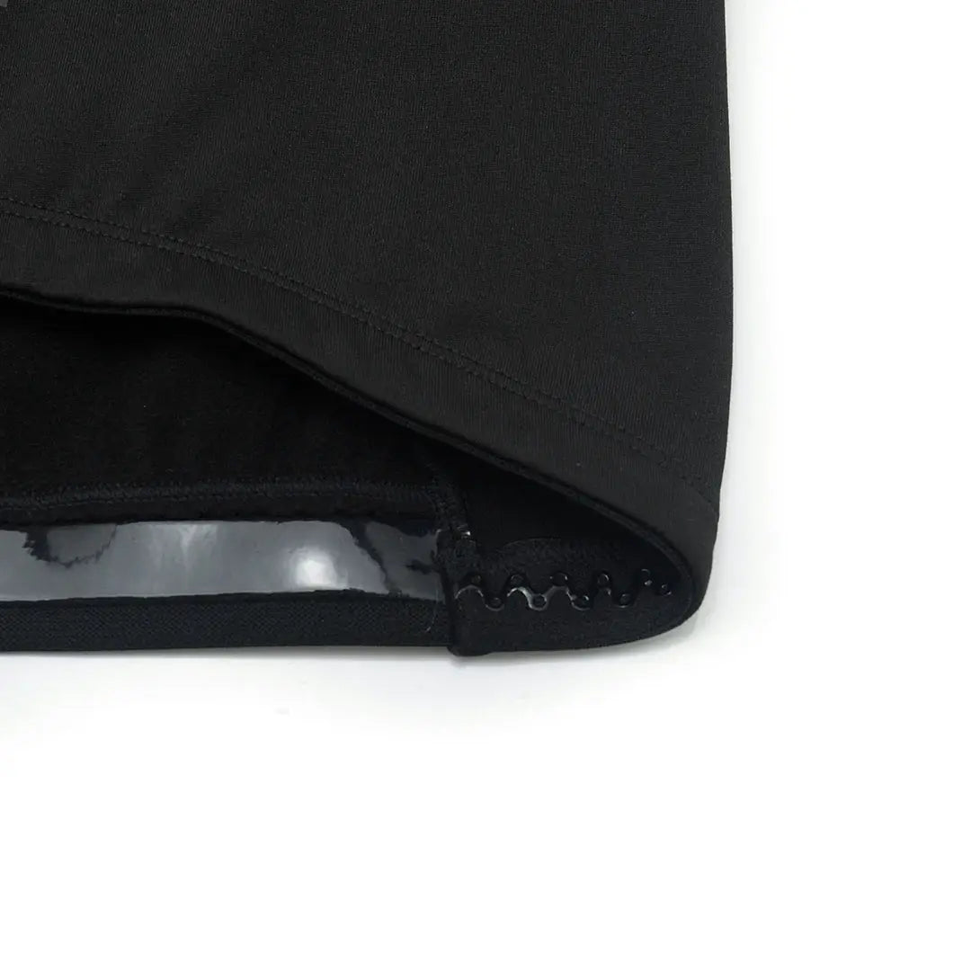 Men's cycling jersey, black, long-sleeve with thermal fleece lining; close-up hem with silicone grip.