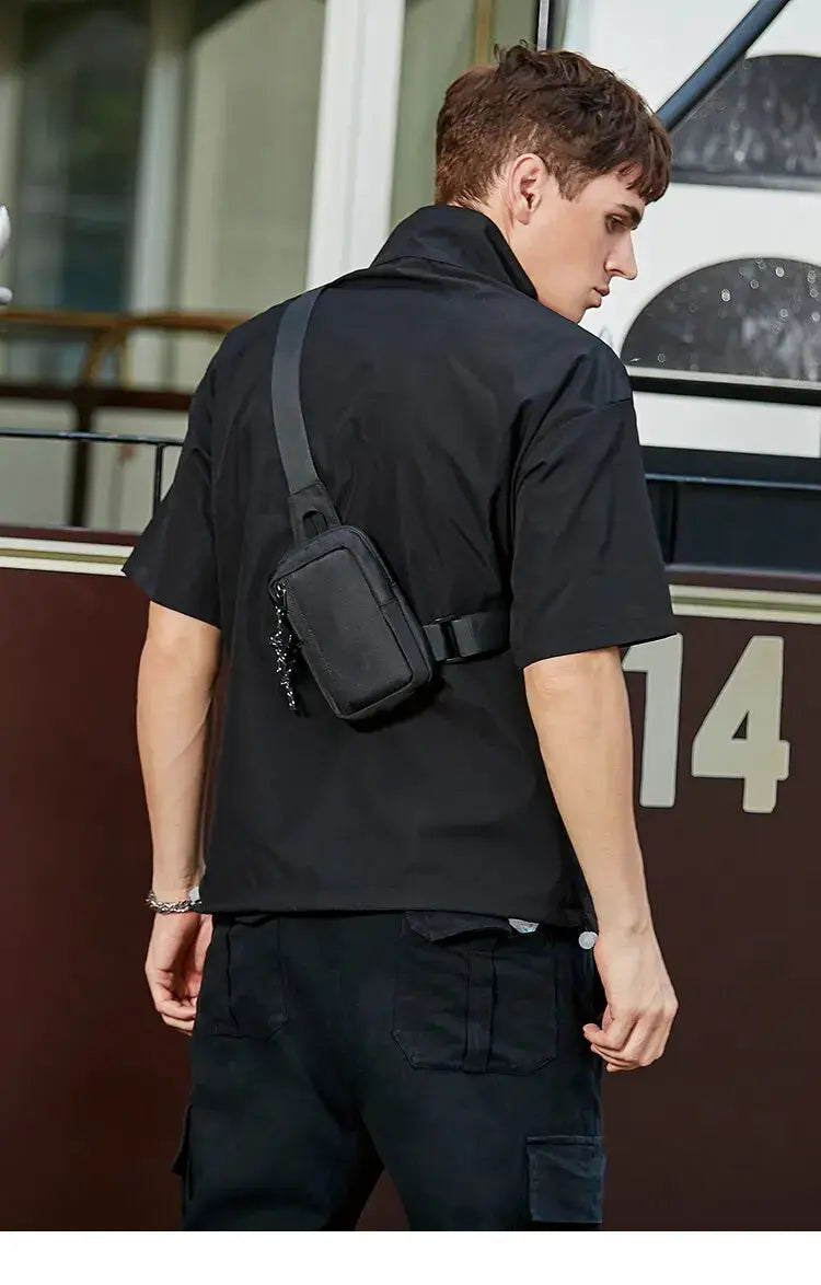 Men's black crossbody mini chest bag with adjustable diagonal strap