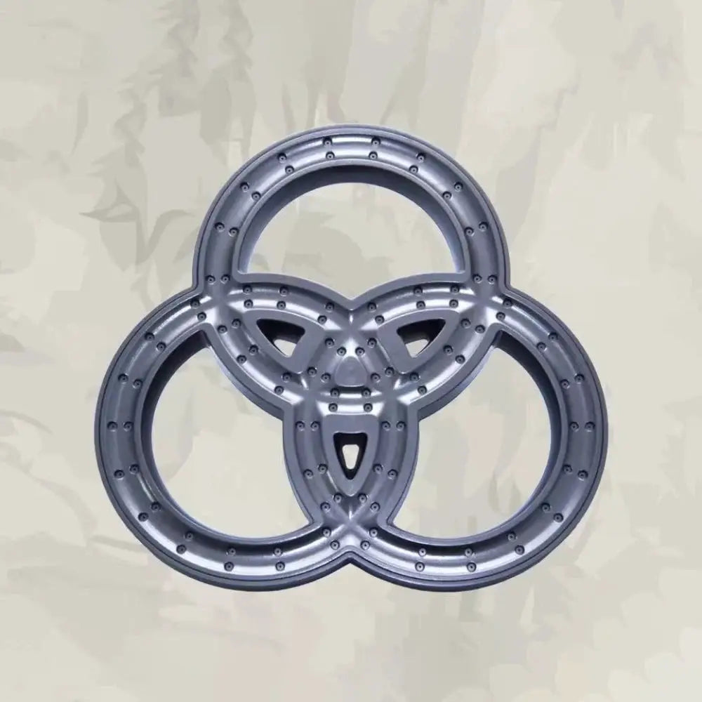 Overhead rainfall shower head with three interconnected chrome rings in silver finish.