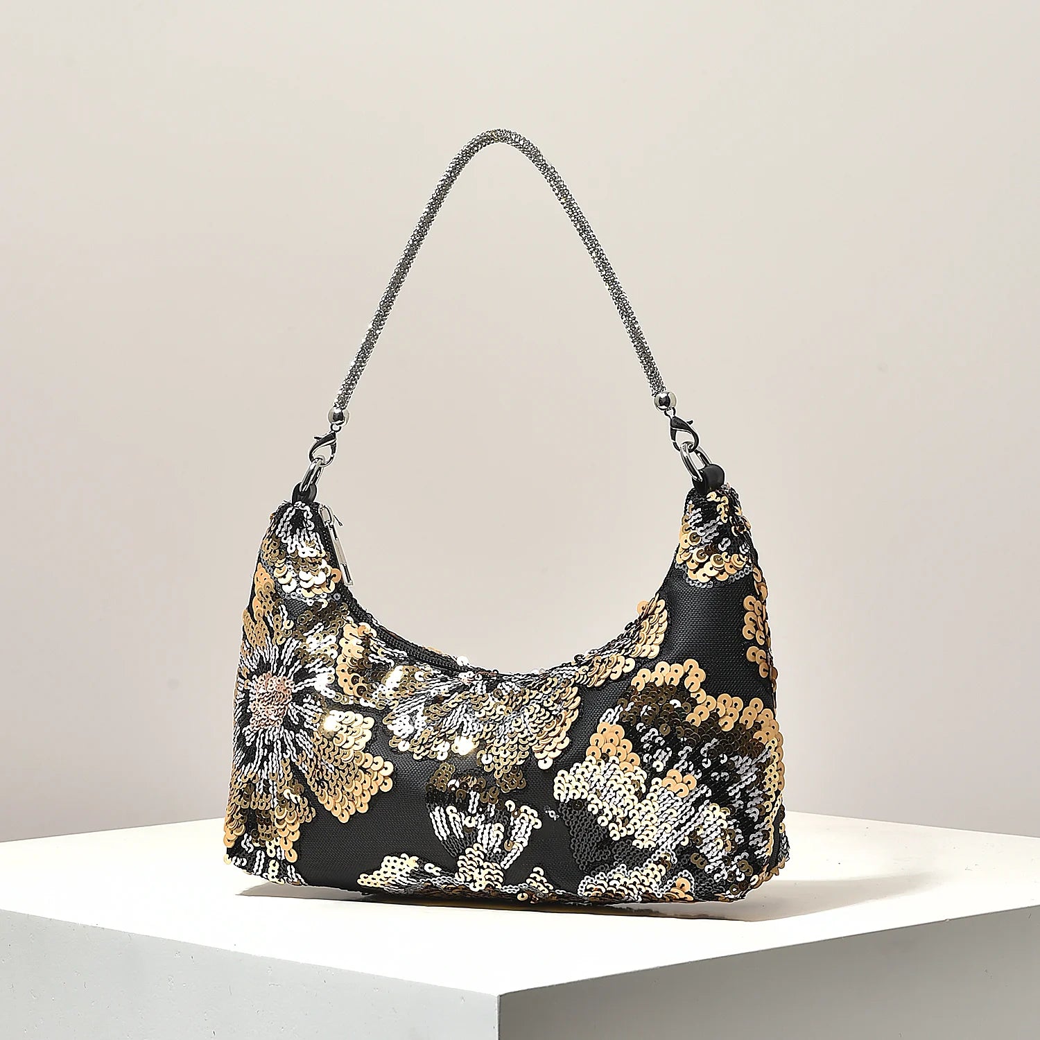 Shoulder bag with black sequins and gold floral embroidery, chain strap
