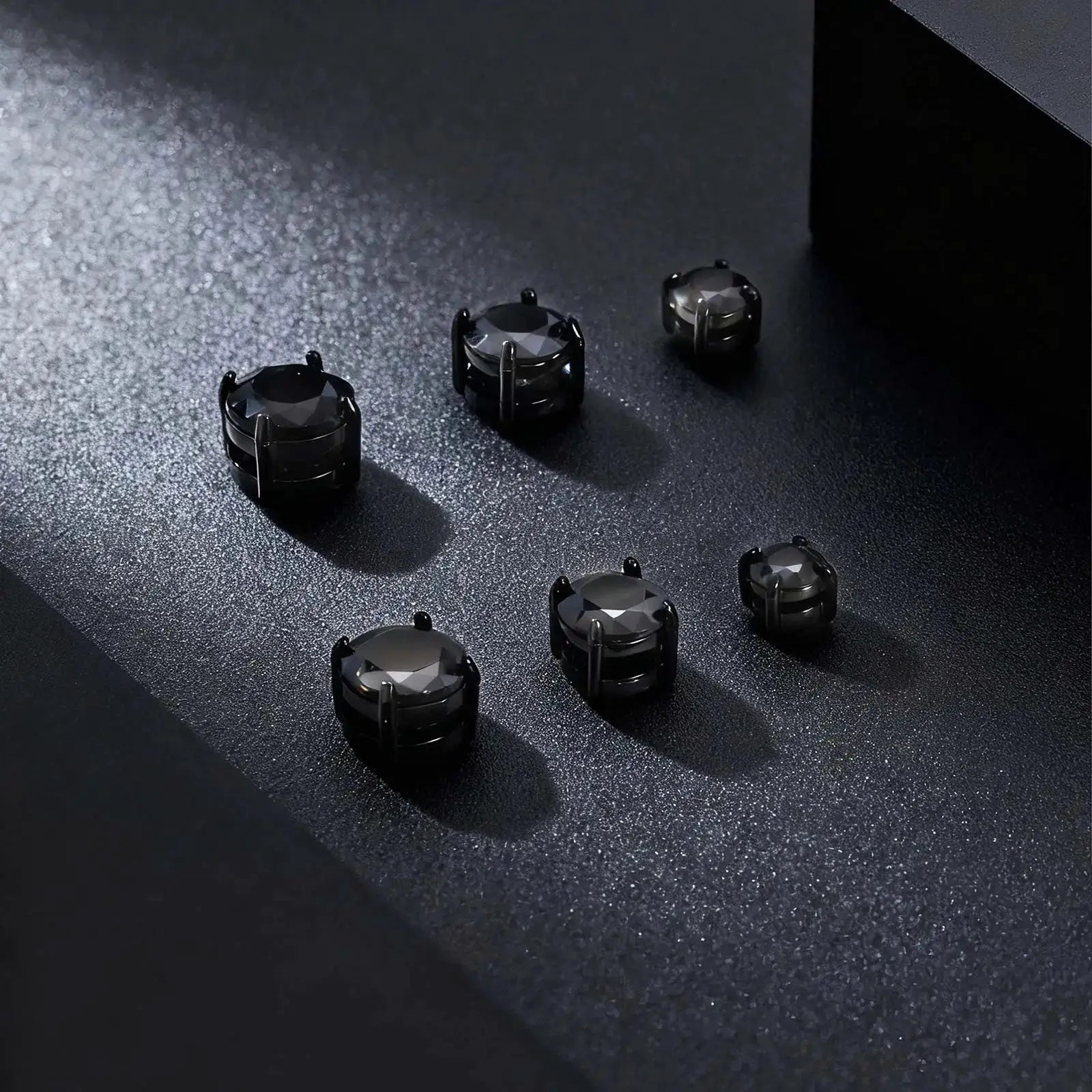 Punk round zircon magnetic ear studs by Simples Market; non-piercing, stainless steel, gunmetal black