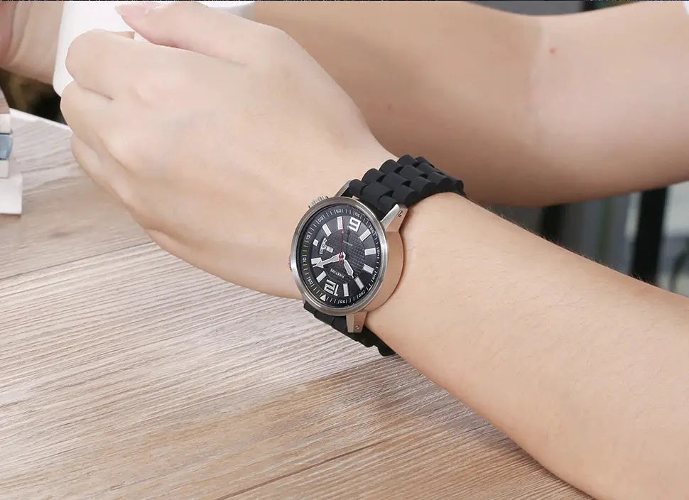 BERNY 20ATM diver watch for men with black silicone strap, rose-gold case and luminous dial.