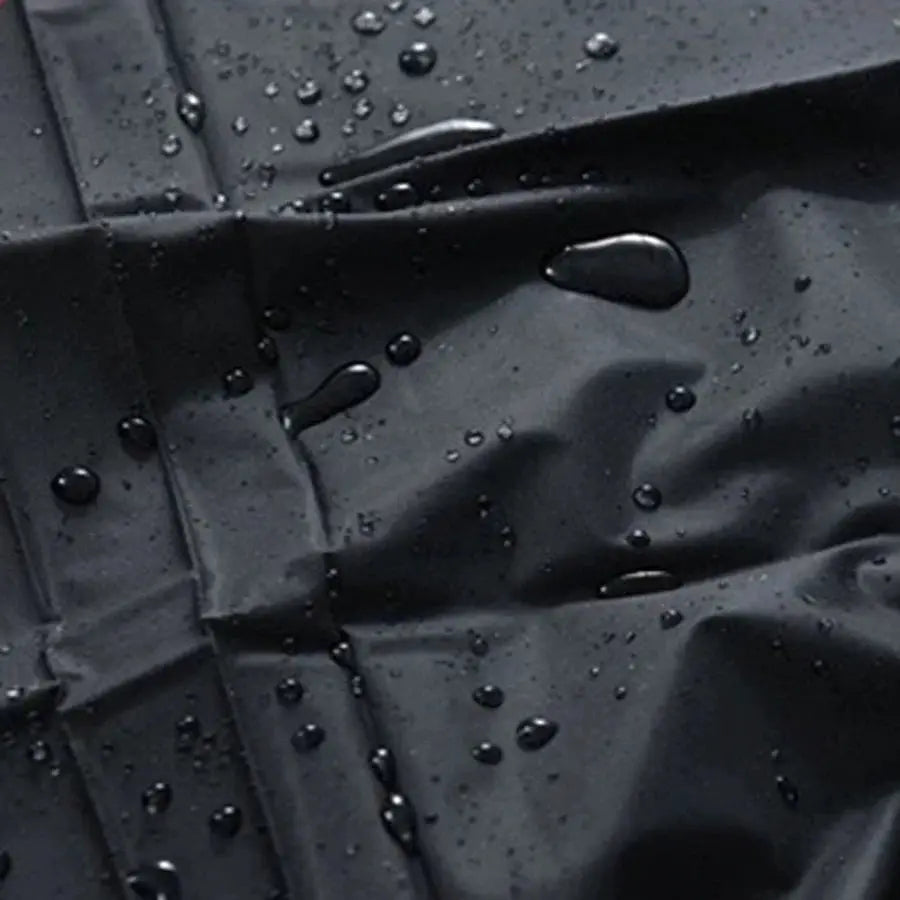 Waterproof cloth sofa cover in gray with water droplets